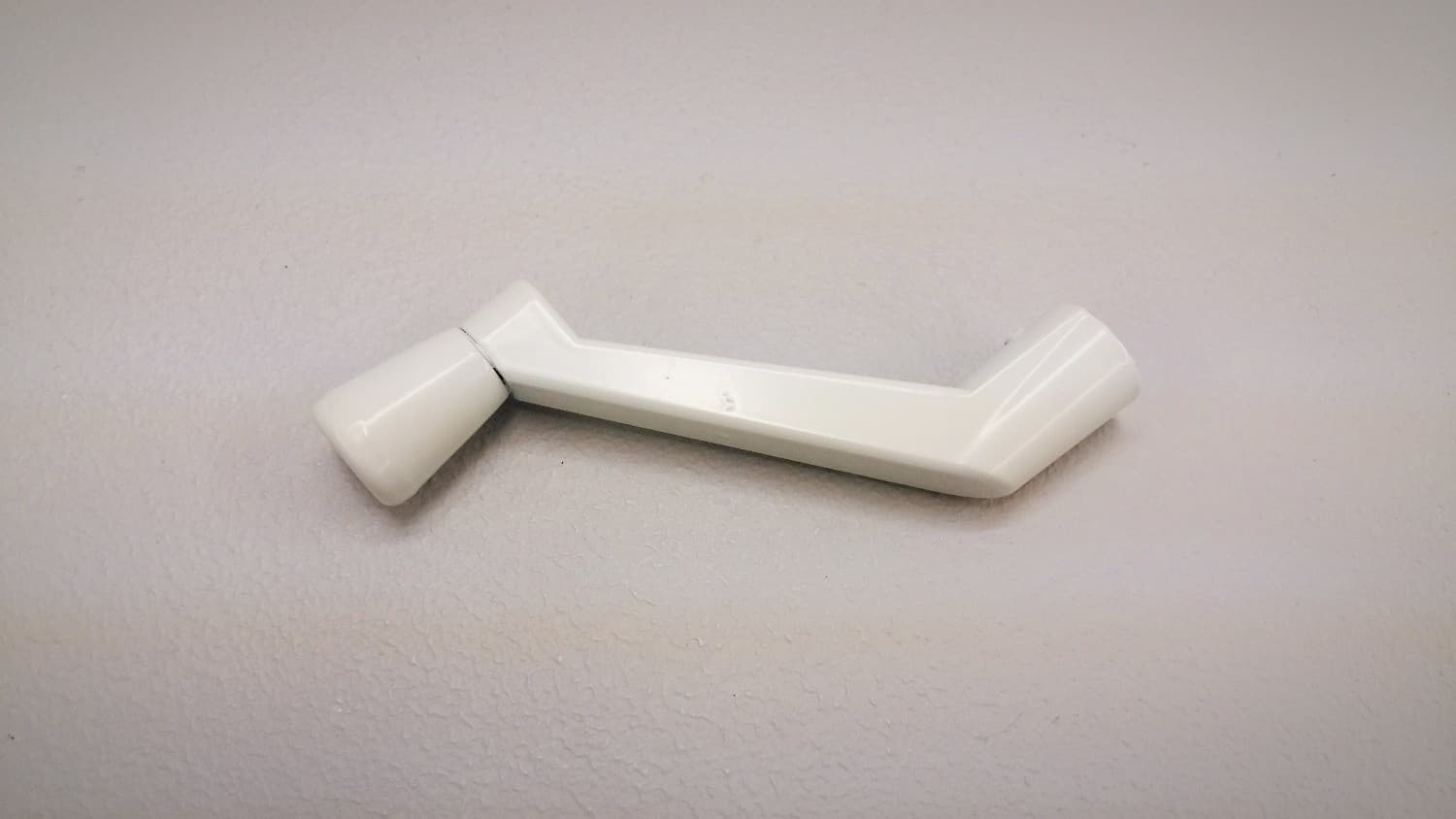 Poignee fixe blanche pour opérateur de fenêtre à battant - Image 1