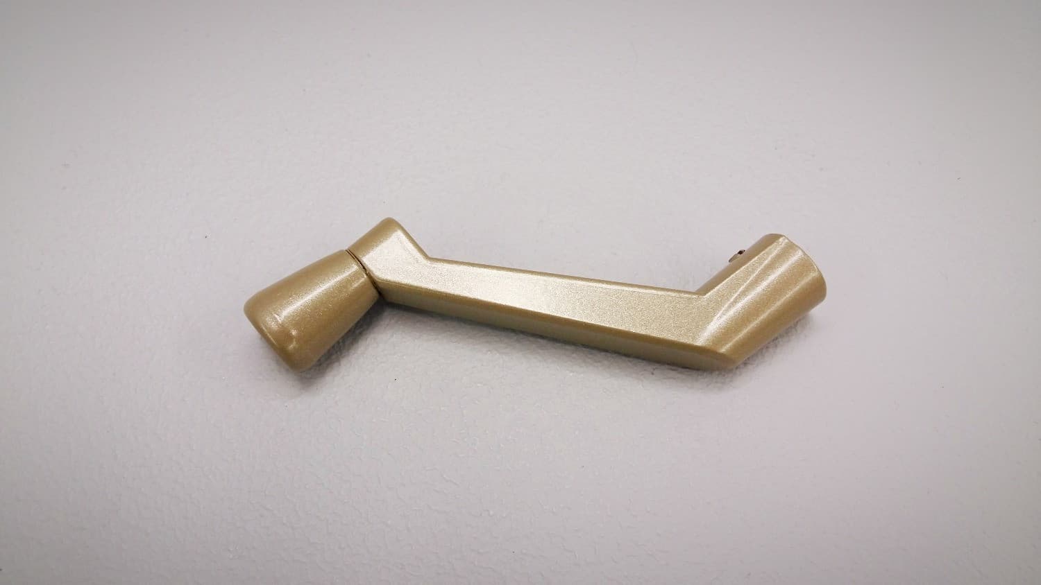 Poignee fixe champagne pour opérateur de fenêtre à battant - Image 1